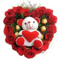 Christmas Flowers to Hyderabad to Send 18 Red Roses and 5 Ferrero Rocher to hyderabad with Teddy Heart