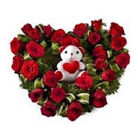 New Year Gifts Delivery in Hyderabad delivers Teddy in Red Roses Heart 24 Flowers to Hyderabad