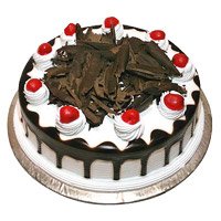 Deliver New Year Cakes in Hyderabad consisting 2 Kg Eggless Black Forest Cake to Vizag