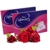 Christmas Gift to Hyderabad. 2 Cadbury Celebration Packs with 4 Red Roses Bunch