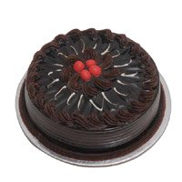 Send Rakhi with 1 Kg Eggless Chocolate Cake to Hyderabad