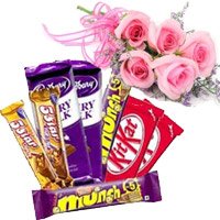 Place order for Twin Five Star and Dairy Milk, Munch, Kitkat Chocolates with 5 Pink Roses Flowers and Christmas Gifts to Hyderabad