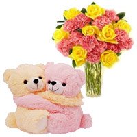 Send New Year Gift to Vizag containing 24 Pink Carnation Yellow Rose Vase With Hugging Teddy Bear