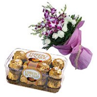 Place Online Order to Send New Year Gifts to Vijayawada. 8 Orchids 12 White Rose Bouquet 16 Pcs Ferrero Rocher Chocolate to Hyderabad