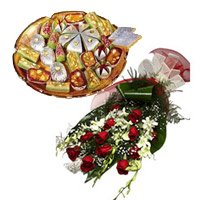 Deliver Christmas Gifts in Hyderabad. 6 White Orchids 12 Red Roses Bunch 1 Kg Assorted Kaju Sweets Online to Hyderabad