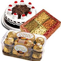 Order  Online New Year Gifts to Hyderabad send to 1/2 Kg Black Forest Cake, 1/2 Kg Dry Fruits and 16 pcs Ferrero Rochers Hyderabad
