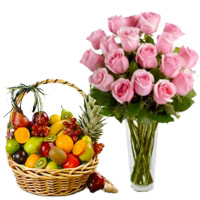 Deliver 12 Pink Roses in Vase with 1 Kg Fresh Fruits Hyderabad in Basket. Diwali Gifts in Hyderabad