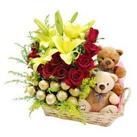Send 2 Lily 12 Roses with 16 Ferrero Rocher and Twin Small Teddy Basket to Hyderabad
