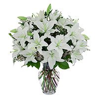 Christmas Flower to Hyderabad. White Lily in Vase 8 Flower Stems