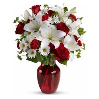 Best Christmas Flowers Delivery in Hyderabad. 2 White Lily 6 White Gerbera 6 Red Roses Vase