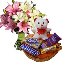 6 Pink White Lily, 6 Inches Teddy with Chocolate Basket. New Year Gifts to Hyderabad Online