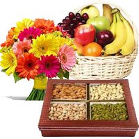 Cheap Online Diwali Gifts to Hyderabad. Send 12 Mix Gerberas, 3 Kg Fresh Fruit Basket, 0.5 Kg Mixed Dry Fruits