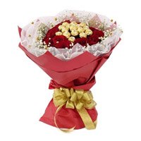 Online Friendship Day Gift Delivery to Hyderabad contains 16 Pcs Ferrero Rocher Chocolate encircled with 20 Red Roses Flowers