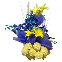 Fresh Flower Delivery in Hyderabad. 4 Yellow Lily 4 Blue Orchids 6 Yellow Carnation Basket on Rakhi