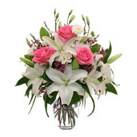 Order Online New Year Flowers to Tirupati send to Pink Roses and White Lily in Vase 12 Flowers in Hyderabad