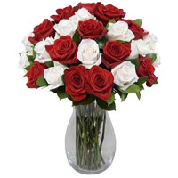 New Year Flowers Delivery in Hyderabad delivers Red White Roses Vase 24 Flowers to Hyderabad