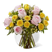New Year Flowers Delivery in Vishakhapatnam. Yellow Pink Roses Vase 18 Flowers