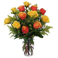 Send Yellow Orange Roses Vase 12 Flowers in Hyderabad on Christmas
