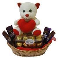Send Diwali Gifts to Hyderabad with 4 Dairy Milk 16 Ferrero Rocher Chocolates and 6 Inch Teddy Basket
