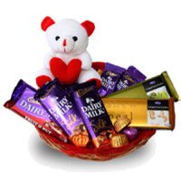 Online Delivery of Dairy Milk, Silk, Temptation Chocolates i Hyderabad with 6 Inch Teddy Basket on Friendship Day