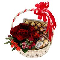 Christmas Gifts Delivery in Hyderabad to Send 12 Red Roses, 40 Pcs Ferrero Rocher Basket
