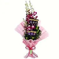 Place Online Order to Send New Year Gifts to Hyderabad send to 12 Red Roses 5 Ferrero Rocher Bouquet Hyderabad