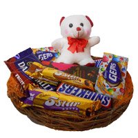 Deliver New Year Gifts in Secunderabad constuting Basket of Exotic Chocolates and 6 Inch Teddy