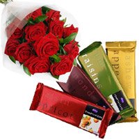 Online Gift of 4 Cadbury Temptation Bars with 12 Red Roses Bunch and Rakhi Flowers to Hyderabad