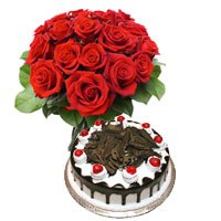 Order Online New Year Gift to Secunderabad that includes Pack of 1/2 Kg Black Forest Cake 12 Red Roses Bouquet Hyderabad