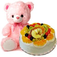 Online Friendship Day Gifts Delivery to Hyderabad comprising 12 Inch Teddy with 1 Kg Eggless Fruit Cake from 5 Star Bakery