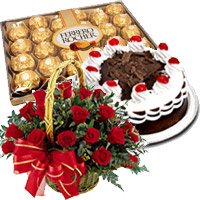 Send 24 Red Roses Basket with 0.5 Kg Black Forest Cake and 24 pcs Ferrero Rocher Chocolate to Hyderabad. Rakhi Gifts to Hyderabad