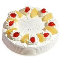 New Year Cakes to Vijayawada incorporated 3 Kg Pineapple Cakes in Hyderabad From 5 Star Bakery